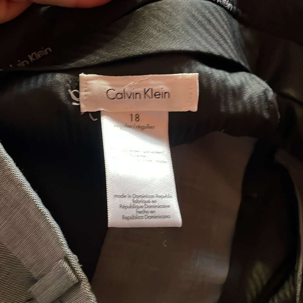 Boys EUC Calvin Klein dress pants.  There are hem spots on left leg
